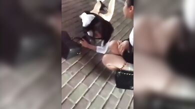 Chinese whore stripped naked in the street