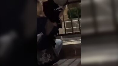 Japanese whore is stripped naked by a customer on the street
