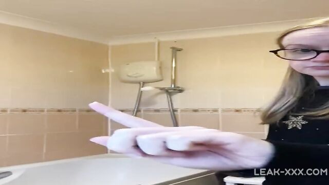 Rebecca Squires with glasses in the shower