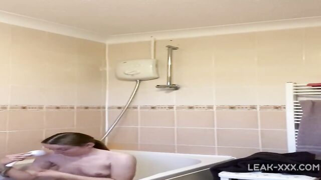 Rebecca Squires with glasses in the shower - 5 image