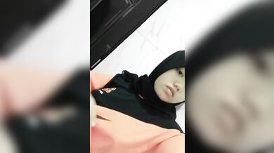 Busty Arab slut plays with her titties
