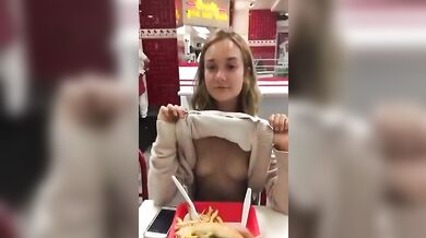 Cute Little Sister Shows Her Boobs To Her Brother In A Cafe