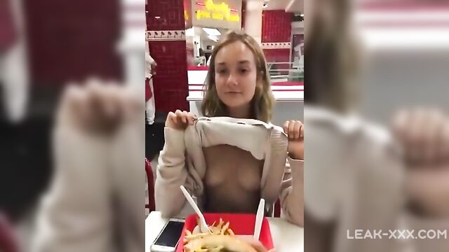 Cute Little Sister Shows Her Boobs To Her Brother In A Cafe