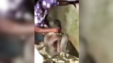 African naked witch wallowed in gutter
