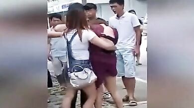 Chinese wife and her gang tries to strip mistress in street