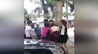 Chinese wife and her gang tries to strip mistress in street