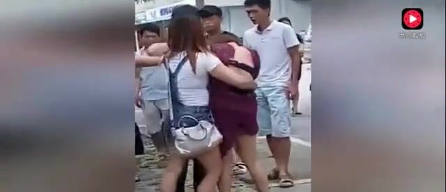 Chinese wife and her gang tries to strip mistress in street