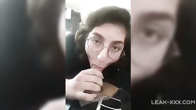 Sister with glasses jerks off brother's dick while parents are in another room