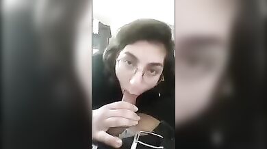 A brunette sister in glasses gave a blowjob to her brother