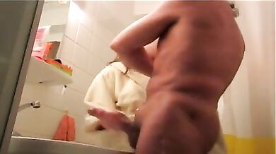 Young daughter jerks off her father's cock