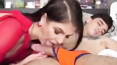 Brunette mom sucks her son's dick while he sleeps