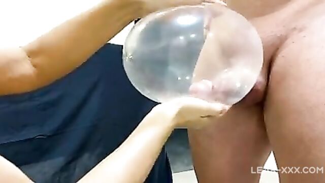 Mom is jerking son's dick with a condom - 3 image