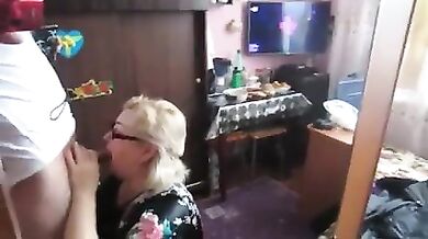 Son bought a camera and made his old mother suck his dick