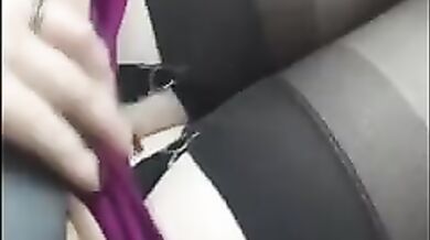 Russian Mom shows off her stockings while sitting behind the wheel