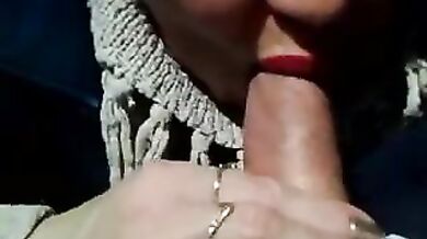 Real mom gives a blowjob to her son in the car